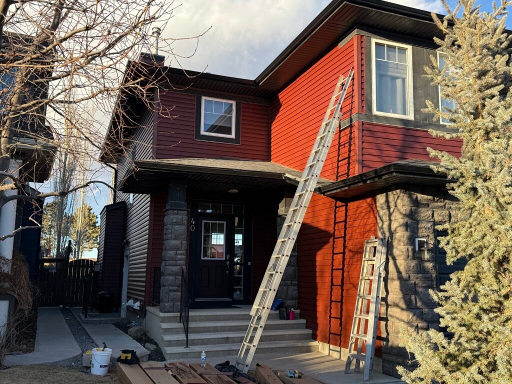 Gentek vinyl siding Class 3 roof and gutters installation in Evanston NW Calgary