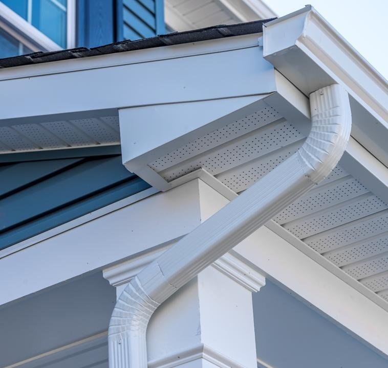 Exterior Contractor Calgary | Siding & Roofing | Pro Pacific Soffit, fascia and downspout details beneath a roof overhang